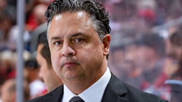DETROIT, MI - OCTOBER 22: Head coach Travis Green of the Vancouver Canucks watches the action from the bench against the Detroit Red Wings during an NHL game at Little Caesars Arena on October 22, 2019 in Detroit, Michigan. Vancouver defeated Detroit 5-2. (Photo by Dave Reginek/NHLI via Getty Images)