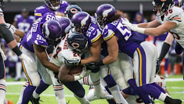 Jan 1, 2017; Minneapolis, MN, USA; Chicago Bears running back Jordan Howard (24) is tackled by Minnesota Vikings linebacker Anthony Barr (55), linebacker Eric Kendricks (54) and defensive end Danielle Hunter (99) during the second quarter at U.S. Bank Stadium. Mandatory Credit: Brace Hemmelgarn-USA TODAY Sports