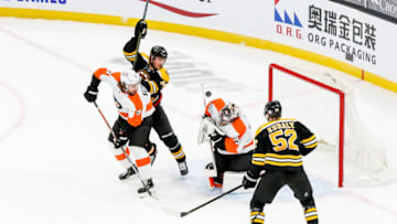 Jan 23, 2021; Boston, Massachusetts, USA; Philadelphia Flyers goalie Carter Hart (79) blocks a shot during the first period against the Boston Bruins at TD Garden. Mandatory Credit: Paul Rutherford-USA TODAY Sports