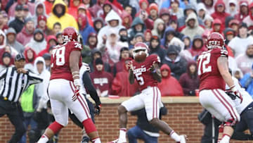 Dec 3, 2016; Norman, OK, USA; Oklahoma Sooners wide receiver Geno Lewis (5) catches a touchdown pass during the first half against the Oklahoma State Cowboys at Gaylord Family - Oklahoma Memorial Stadium. Mandatory Credit: Kevin Jairaj-USA TODAY Sports