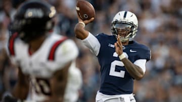 STATE COLLEGE, PENNSYLVANIA - SEPTEMBER 11: Ta'Quan Roberson #2 of the Penn State Nittany Lions throws a pass for a touchdown against the Ball State Cardinals during the second half at Beaver Stadium on September 11, 2021 in State College, Pennsylvania. (Photo by Scott Taetsch/Getty Images)