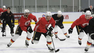 BEIJING, CHN - SEPTEMBER 17: Austin Czarnik #27 of the Calgary Flames skates during practice at the O.R.G. AZ Rink on September 17, 2018 in Beijing, China. (Photo by Brian Babineau/NHLI via Getty Images)