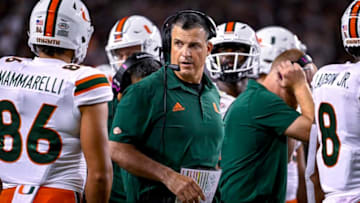 Miami Hurricanes head coach Mario Cristobal talks with this team (Jerome Miron-USA TODAY Sports)