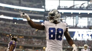 Aug 16, 2014; Arlington, TX, USA; Dallas Cowboys receiver Dez Bryant (88) celebrates after catching a touchdown pass in the first quarter against Baltimore Ravens cornerback Dominque Franks (42) at AT&T Stadium. Mandatory Credit: Matthew Emmons-USA TODAY Sports