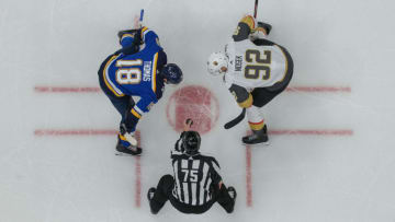 ST. LOUIS, MO - DECEMBER 12: Robert Thomas #18 of the St. Louis Blues faces off against Tomas Nosek #92 of the Vegas Golden Knights at Enterprise Center on December 12, 2019 in St. Louis, Missouri. (Photo by Joe Puetz/NHLI via Getty Images)