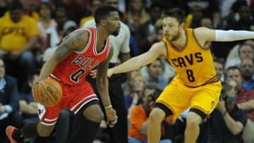 May 6, 2015; Cleveland, OH, USA; Chicago Bulls guard Aaron Brooks (0) and Cleveland Cavaliers guard Matthew Dellavedova (8) in game two of the second round of the NBA Playoffs at Quicken Loans Arena. The Cavs won 106-91. Mandatory Credit: Ken Blaze-USA TODAY Sports