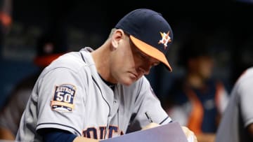Jul 10, 2015; St. Petersburg, FL, USA; Houston Astros manager A.J. Hinch (14) looks at the lineup card against the Tampa Bay Rays at Tropicana Field. Mandatory Credit: Kim Klement-USA TODAY Sports