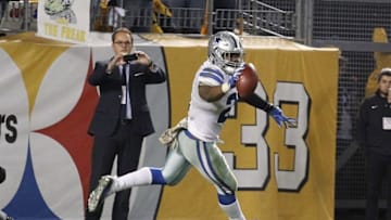 Nov 13, 2016; Pittsburgh, PA, USA; Dallas Cowboys running back Ezekiel Elliott (21) celebrates his thirty-two yard touchdown to win the game against the Pittsburgh Steelers during the fourth quarter at Heinz Field. Dallas won 35-30. Mandatory Credit: Charles LeClaire-USA TODAY Sports