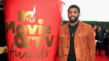 SANTA MONICA, CA - JUNE 16: NBA player Kyrie Irving attends the 2018 MTV Movie And TV Awards at Barker Hangar on June 16, 2018 in Santa Monica, California. (Photo by Christopher Polk/Getty Images for MTV)
