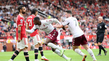 MANCHESTER, ENGLAND - SEPTEMBER 25: Kortney Hause of Aston Villa celebrates with teammate John McGinn after scoring their team's first goal during the Premier League match between Manchester United and Aston Villa at Old Trafford on September 25, 2021 in Manchester, England. (Photo by Laurence Griffiths/Getty Images)