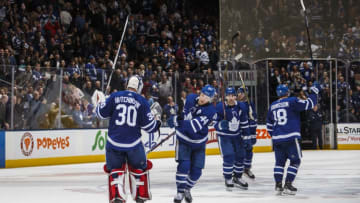 TORONTO, ON - JANUARY 5: Michael Hutchinson #30 of the Toronto Maple Leafs and teammates salute the crowd after their shutout victory over the Vancouver Canucks at the Scotiabank Arena on January 5, 2019 in Toronto, Ontario, Canada. (Photo by Kevin Sousa/NHLI via Getty Images)