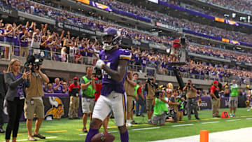 MINNEAPOLIS, MN - SEPTEMBER 24: Stefon Diggs #14 of the Minnesota Vikings celebrates a touchdown in the second quarter of the game agains the Tampa Bay Buccaneers on September 24, 2017 at U.S. Bank Stadium in Minneapolis, Minnesota. (Photo by Adam Bettcher/Getty Images)