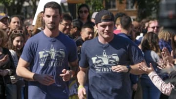 "You're a Champion, Prove It"--Alexander Rossi (left) and Conor Daly (right), Indy Car Drivers from Indiana, make their way to the starting line in the iconic Washington Square Park in New York City in the premiere of the 30th season of THE AMAZING RACE, airing Wednesday, Jan. 3 on the CBS Television Network. Photo: Timothy Kuratek/CBS ÃÂ©2017 CBS Broadcasting, Inc. All Rights Reserved