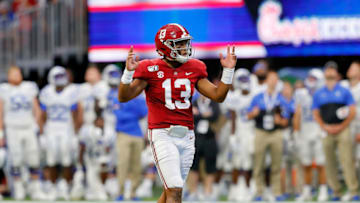 ATLANTA, GEORGIA - AUGUST 31: Tua Tagovailoa #13 of the Alabama Crimson Tide reacts after passing for a touchdown in the first half against the Duke Blue Devils at Mercedes-Benz Stadium on August 31, 2019 in Atlanta, Georgia. (Photo by Kevin C. Cox/Getty Images)