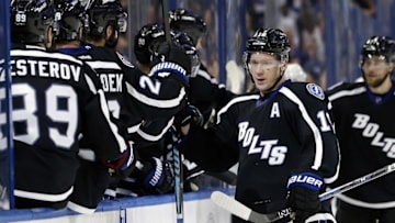 Nov 25, 2016; Tampa, FL, USA; Tampa Bay Lightning left wing Ondrej Palat (18) is congratulated by teammates after scoring against the Columbus Blue Jackets during the third period at Amalie Arena. The Blue Jackets defeated the Lightning 5-3. Mandatory Credit: Kim Klement-USA TODAY Sports