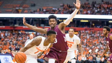 SYRACUSE, NY - NOVEMBER 11: Frank Howard #1 of the Syracuse Orange drives past Jordan Swopshire #15 of the Colgate Raiders during the first half at The Carrier Dome on November 11, 2016 in Syracuse, New York. (Photo by Brett Carlsen/Getty Images)