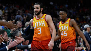 SALT LAKE CITY, UT - JANUARY 30: Ricky Rubio #3 and teammate Donovan Mitchell #45 of the Utah Jazz are greeted near the end of a of a game they won 129-99 over the Golden State Warriors at Vivint Smart Home Arena on January 30, 2018 in Salt Lake City, Utah. (Photo by Gene Sweeney Jr./Getty Images)