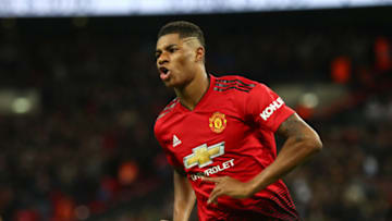 LONDON, ENGLAND - JANUARY 13: Marcus Rashford of Manchester United celebrates after scoring his team's first goal during the Premier League match between Tottenham Hotspur and Manchester United at Wembley Stadium on January 13, 2019 in London, United Kingdom. (Photo by Clive Rose/Getty Images)