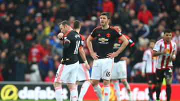 SUNDERLAND, ENGLAND - FEBRUARY 13: Wayne Rooney of Manchester United walks back to restart the match after his side lose a second goal during the Barclays Premier League match between Sunderland and Manchester United at The Stadium of Light on February 13, 2016 in Sunderland, England. (Photo by Ian MacNicol/Getty images)