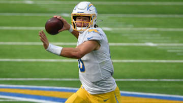 Sep 27, 2020; Inglewood, California, USA; Los Angeles Chargers quarterback Justin Herbert (10) throws a pass during the third quarter against the Carolina Panthers at SoFi Stadium. Mandatory Credit: Robert Hanashiro-USA TODAY Sports