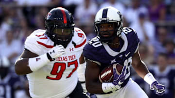 FORT WORTH, TX - OCTOBER 29: Deante Gray #20 of the TCU Horned Frogs runs the ball Joseph Wallace #97 of the Texas Tech Red Raiders in the first half at Amon G. Carter Stadium on October 29, 2016 in Fort Worth, Texas. (Photo by Ronald Martinez/Getty Images)