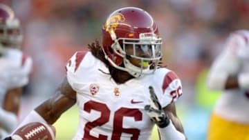 Aug 29, 2013; Honolulu, HI, USA; Southern California Trojans safety Josh Shaw (26) scores on a 35-yard interception return in the second quarter against the Hawaii Rainbow Warriors at Aloha Stadium. Mandatory Credit: Kirby Lee-USA TODAY Sports