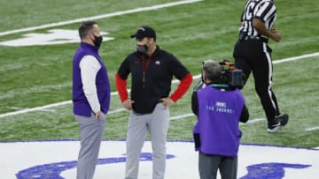 Northwestern Wildcats head coach Pat Fitzgerald talks to Ohio State Buckeyes head coach Ryan Day prior to the Big Ten Championship football game at Lucas Oil Stadium in Indianapolis on Saturday, Dec. 19, 2020.Big Ten Championship Ohio State Northwestern