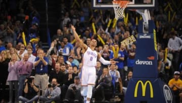 Feb 6, 2015; Oklahoma City, OK, USA; Oklahoma City Thunder guard Russell Westbrook (0) reacts after a dunk against the New Orleans Pelicans during the third quarter at Chesapeake Energy Arena. Mandatory Credit: Mark D. Smith-USA TODAY Sports
