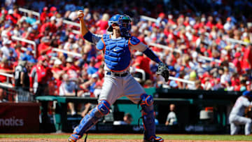 ST. LOUIS, MO - APRIL 21: Travis d'Arnaud #18 of the New York Mets throws the ball against the St. Louis Cardinals at Busch Stadium on April 21, 2019 in St. Louis, Missouri. (Photo by Dilip Vishwanat/Getty Images)