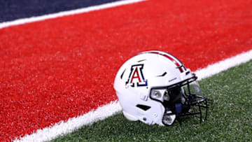 Sep 2, 2023; Tucson, Arizona, USA; Arizona Wildcats quarterback Jayden de Laura (7) helmet on the field after a victory over Northern Arizona Lumberjacks at Arizona Stadium. Mandatory Credit: Zac BonDurant-USA TODAY Sports