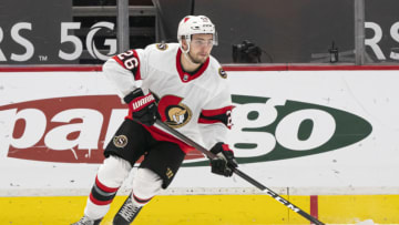 VANCOUVER, BC - APRIL 22: Erik Brannstrom #26 of the Ottawa Senators skates with the puck during NHL action against the Vancouver Canucks at Rogers Arena on April 22, 2021 in Vancouver, Canada. (Photo by Rich Lam/Getty Images)