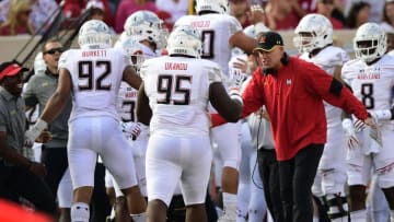 Oct 29, 2016; Bloomington, IN, USA; Maryland Terrapins head coach D. J. Durkin high fives his players after they stopped a Indiana Hoosiers first down during the first half of the game at Memorial Stadium. Mandatory Credit: Marc Lebryk-USA TODAY Sports