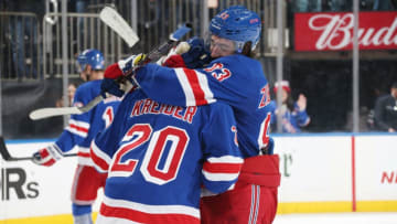 NEW YORK, NY - NOVEMBER 17: Mika Zibanejad #93 hugs Chris Kreider #20 of the New York Rangers after defeating the Florida Panthers 4-2 at Madison Square Garden on November 17, 2018 in New York City. (Photo by Jared Silber/NHLI via Getty Images)
