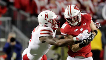 Wisconsin safety Collin Wilder (18) picks off a pass intended for Nebraska wide receiver Omar Manning