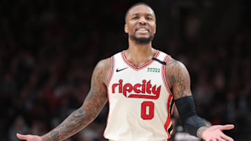 Damian Lillard #0 of the Portland Trail Blazers reacts to a call in the third quarter against the Miami Heat (Photo by Abbie Parr/Getty Images)