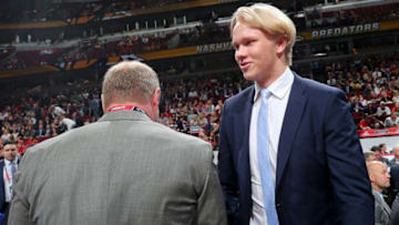 CHICAGO, IL - JUNE 24: Eemeli Rasanen meets with executives after being selected 59th overall by the Toronto Maple Leafs during the 2017 NHL Draft at the United Center on June 24, 2017 in Chicago, Illinois. (Photo by Bruce Bennett/Getty Images)