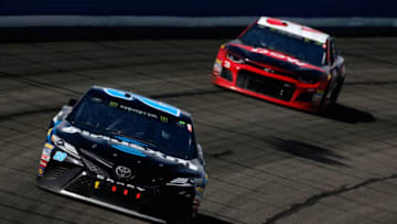 FONTANA, CA - MARCH 18: Erik Jones, driver of the #20 SiriusXM Toyota, leads Austin Dillon, driver of the #3 Dow Coating Chevrolet, during the Monster Energy NASCAR Cup Series Auto Club 400 at Auto Club Speedway on March 18, 2018 in Fontana, California. (Photo by Jonathan Ferrey/Getty Images)