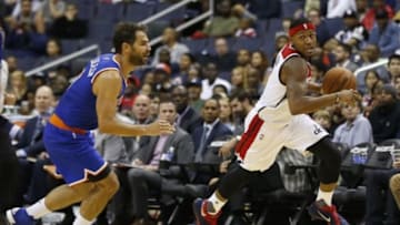 Oct 9, 2015; Washington, DC, USA; Washington Wizards guard Bradley Beal (3) dribbles the ball as New York Knicks guard Jose Calderon (3) chases in the third quarter at Verizon Center. The Knicks won 115-104. Mandatory Credit: Geoff Burke-USA TODAY Sports