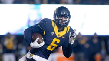 Nov 28, 2015; Berkeley, CA, USA; California Golden Bears wide receiver Chad Hansen (6) carries the ball against the Arizona State Sun Devils during the third quarter at Memorial Stadium. The California Golden Bears defeated the Arizona State Sun Devils 48-46. Mandatory Credit: Kelley L Cox-USA TODAY Sports