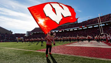 Nov 12, 2016; Madison, WI, USA; Wisconsin Badgers mascot Bucky Badger waves the Wisconsin flag prior to the game against the Illinois Fighting Illini at Camp Randall Stadium. Wisconsin won 48-3. Mandatory Credit: Jeff Hanisch-USA TODAY Sports
