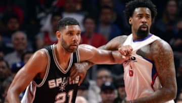 Feb 18, 2016; Los Angeles, CA, USA; San Antonio Spurs center Tim Duncan (21) and Los Angeles Clippers center DeAndre Jordan (6) jostle for position on the baseline during the 2nd half at Staples Center. Mandatory Credit: Robert Hanashiro-USA TODAY Sports