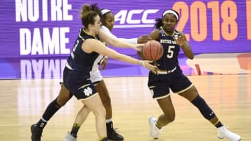 COLUMBUS, OH - APRIL 1: Roshunda Johnson #11 of the Mississippi State Bulldogs reaches for the ball between Marina Mabrey #3 and Jackie Young #5 of the Notre Dame Fighting Irish during the championship game of the 2018 NCAA Division I Women's Basketball Final Four at Nationwide Arena in Columbus, Ohio. (Photo by Tim Nwachukwu/NCAA Photos via Getty Images)