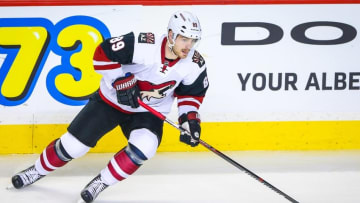 Jan 7, 2016; Calgary, Alberta, CAN; Arizona Coyotes left wing Mikkel Boedker (89) controls the puck against the Calgary Flames during the first period at Scotiabank Saddledome. Arizona Coyotes won 2-1. Mandatory Credit: Sergei Belski-USA TODAY Sports