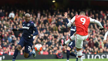 LONDON, ENGLAND - MARCH 07: Alexandre Lacazette of Arsenal scores his team's first goal during the Premier League match between Arsenal FC and West Ham United at Emirates Stadium on March 07, 2020 in London, United Kingdom. (Photo by Harriet Lander/Copa/Getty Images )