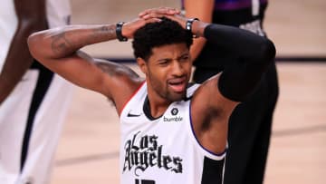 LAKE BUENA VISTA, FLORIDA - SEPTEMBER 09: Paul George #13 of the LA Clippers reacts during the second quarter against the Denver Nuggets in Game Four of the Western Conference Second Round during the 2020 NBA Playoffs at AdventHealth Arena at the ESPN Wide World Of Sports Complex on September 09, 2020 in Lake Buena Vista, Florida. NOTE TO USER: User expressly acknowledges and agrees that, by downloading and or using this photograph, User is consenting to the terms and conditions of the Getty Images License Agreement. (Photo by Mike Ehrmann/Getty Images)