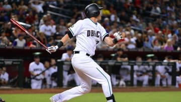 Sep 9, 2016; Phoenix, AZ, USA; Arizona Diamondbacks infielder Jake Lamb (22) hits a solo home run against the San Francisco Giants during the tenth inning at Chase Field. Mandatory Credit: Jennifer Stewart-USA TODAY Sports