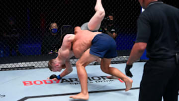 LAS VEGAS, NEVADA - AUGUST 11: (R-L) Dustin Stoltzfus slams Joe Pyfer in a middleweight fight during week two of Dana White's Contender Series season four at UFC APEX on August 11, 2020 in Las Vegas, Nevada. (Photo by Chris Unger/DWCS LLC/Zuffa LLC)