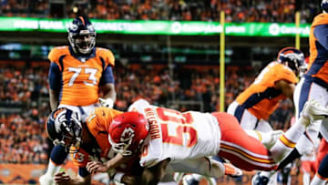 Nov 27, 2016; Denver, CO, USA; Kansas City Chiefs outside linebacker Justin Houston (50) forces a fumble against Denver Broncos quarterback Trevor Siemian (13) in the second quarter at Sports Authority Field at Mile High. Mandatory Credit: Isaiah J. Downing-USA TODAY Sports