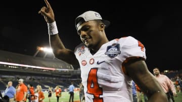 Dec 3, 2016; Orlando, FL, USA; Clemson Tigers quarterback Deshaun Watson (4) walks off the field after a game against the Virginia Tech Hokies during the ACC Championship college football game at Camping World Stadium. Clemson Tigers won 42-35. Mandatory Credit: Logan Bowles-USA TODAY Sports