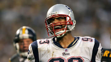 PITTSBURGH, PA - SEPTEMBER 25: Richard Seymour #93 of the New England Patriots smiles after his sack in front of Alan Faneca #66 of the Pittsburgh Steelers during the fourth quarter at Heinz Field on September 25, 2005 in Pittsburgh, Pennsylvania. The Patriots won 23-20. (Photo by Harry How/Getty Images)
